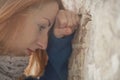 Depression, hopelessness, frustration, anxiety concept. Stressed beautiful woman leaning on the wall