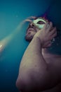 Depression, man in blue tub full of water, sadness concept Royalty Free Stock Photo