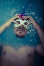 Depression, man in blue tub full of water, sadness concept Royalty Free Stock Photo