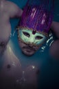 Depression, man in blue tub full of water, sadness concept Royalty Free Stock Photo