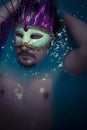 Depression, man in blue tub full of water, sadness concept Royalty Free Stock Photo