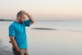 Depression - Man standing by the sea Royalty Free Stock Photo