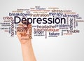 Depression word cloud and hand with marker concept Royalty Free Stock Photo