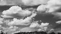 The sky is in gloomy clouds,mountains against the background of rain clouds,industry and the release of dirt into the air,close-up Royalty Free Stock Photo