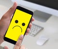 Depressive emotions concept, smiley face emoticon printed depr