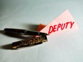 deputy text displayed on paperslip with pen concept Royalty Free Stock Photo