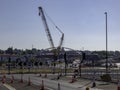 A Large Crane in position to lift new footbridge .