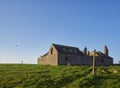 Ruined and abandoned Farm buildings near to the Scottish Coast at Usan, with its roof collapsed in. Royalty Free Stock Photo