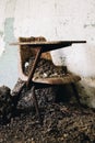 Derelict Chair + Poop - Abandoned Creedmoor State Hospital - New York Royalty Free Stock Photo