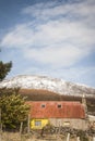 Derelict Croft and the Tap O` Noth mountain in Scotland. Royalty Free Stock Photo