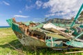 Derelict Fishing Boat out of sea in afternoon light in Pomos harbor Royalty Free Stock Photo