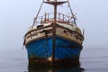 Derelict fishing boat waiting to sink or be renovated Royalty Free Stock Photo