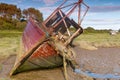 Derelict boat wrecks in mud flats at Heswall Royalty Free Stock Photo