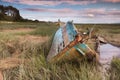 Mud flats and derelict boats at Heswall near Liverpool Royalty Free Stock Photo