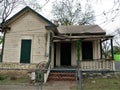 Abandoned house with sagging porch
