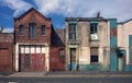 Derelict houses and abandoned commercial property on street Royalty Free Stock Photo