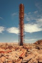 Derelict and industrial rusting chimney at the historic Humberstone saltpeter in the Atacama desert near Iquique, northern Chile