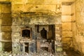 Derelict interior, fireplace