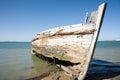 Derelict oyster boat on beach