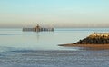 Derelict pier and sea defences Royalty Free Stock Photo