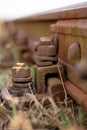 Derelict railway, rusty bolt with nut.