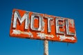 Derelict Red Motel Sign with 3 Arrows Royalty Free Stock Photo