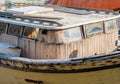 Derelict wood boat in dry dock