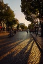 Deribasovskaya streets in the rays of the setting summer sun in Odessa Ukraine