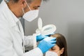 Dermatologist Doctor Checking Woman Hair For Dandruff