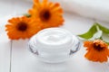 Dermatology herbal cosmetic cream with calendula vitamin spa lotion Royalty Free Stock Photo