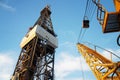 Derrick of Jack Up Oil Drilling Rig and Rig Crane Royalty Free Stock Photo