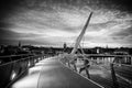 Derry, Ireland. Illuminated Peace bridge in Derry Londonderry, City of Culture, in Northern Ireland with city center at