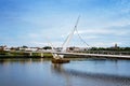 Derry, Ireland. Illuminated Peace bridge in Derry Londonderry, City of Culture, in Northern Ireland with city center at