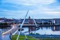 Derry, Ireland. Illuminated Peace bridge in Derry Londonderry, City of Culture, in Northern Ireland with city center at