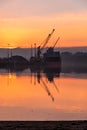 Derry, Londonderry, United Kingdom - December 19 2021: Staff working on the river foyle harbour in Northern Ireland Royalty Free Stock Photo