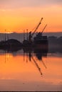 Derry, Londonderry, United Kingdom - December 19 2021: Staff working on the river foyle harbour in Northern Ireland Royalty Free Stock Photo