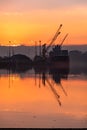 Derry, Londonderry, United Kingdom - December 19 2021: Staff working on the river foyle harbour in Northern Ireland Royalty Free Stock Photo