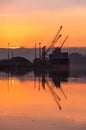 Derry, Londonderry, United Kingdom - December 19 2021: Staff working on the river foyle harbour in Northern Ireland Royalty Free Stock Photo