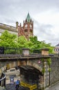 Derry City Walls gate with the Guildhall behind