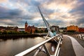 Peace bridge in Derry Londonderry in Northern Ireland, UK with city center at the background Royalty Free Stock Photo