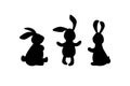 Three bunnies, rabbits silhouette on white background. Royalty Free Stock Photo