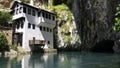 Dervish House or Blagaj Tekija on Buna river. The building is a Dervish monastery outside Mostar city and nearly 600 years old - B Royalty Free Stock Photo
