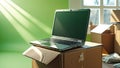 Laptop on Moving Boxes: Relocation and Remote Work Concept Royalty Free Stock Photo