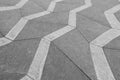 A desaturated and distorted photograph of a patterned sidewalk i Royalty Free Stock Photo