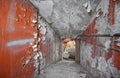 Descending down the concrete staircase in an abandoned bomb shelter