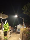 descending roads and street lights in Indonesian mountain villages