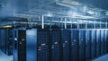 Descending Shot of Modern Data Center With Multiple Rows of Operational Server Racks. Modern High- Royalty Free Stock Photo