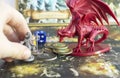 Descent board game, role playing game, dungeons and dragons, dnd. Hand holding a miniature of a warrior. Royalty Free Stock Photo