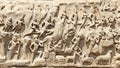 Bas relief rock cut sculptures of Gods, people and animals carved in monolithic rock Royalty Free Stock Photo