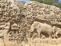 Bas relief rock cut sculptures of Gods, people and animals carved in monolithic rock Royalty Free Stock Photo